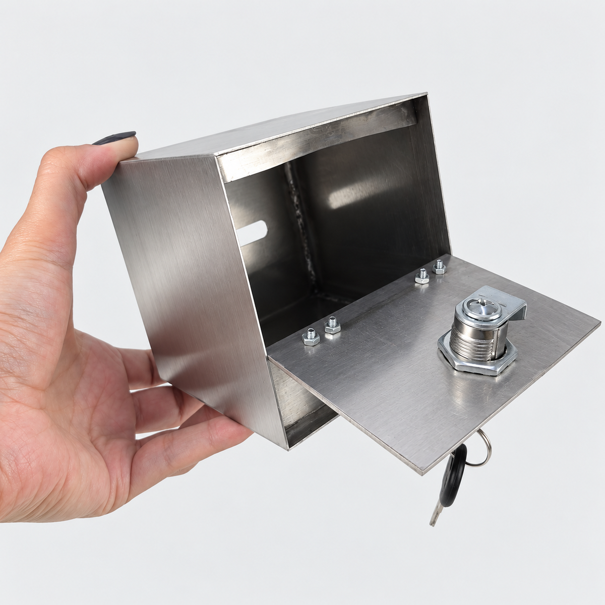 Open bottom door showing the interior of the locking gratuity box